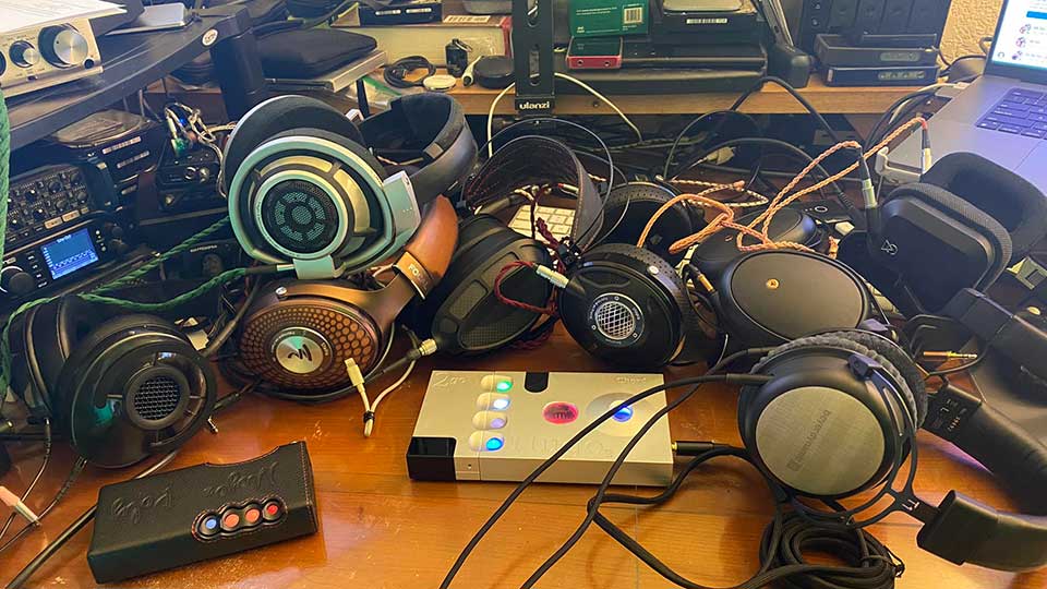 Audiophile table with lots of headphones