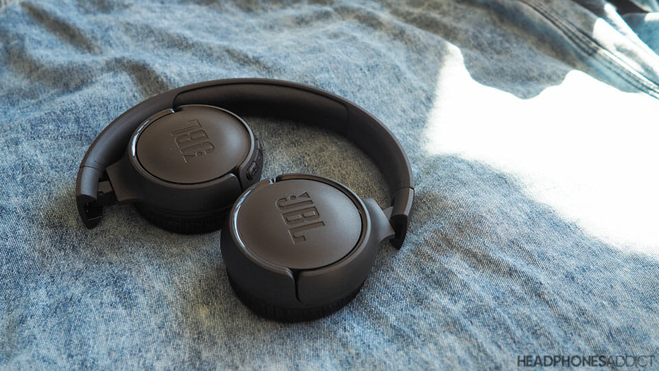 JBL Tune 500BT wireless headphones on jeans