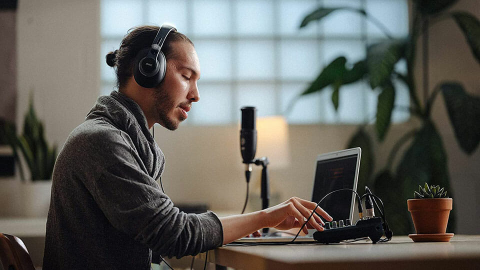 Man listening to AKG K371-BT