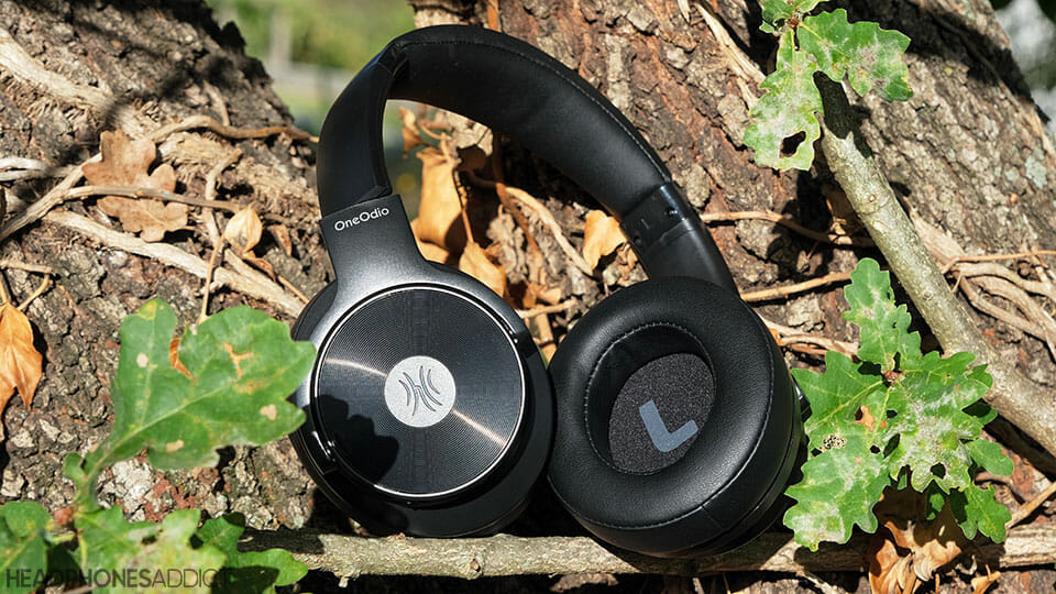 OneOdio A30 wireless headphones on a branch