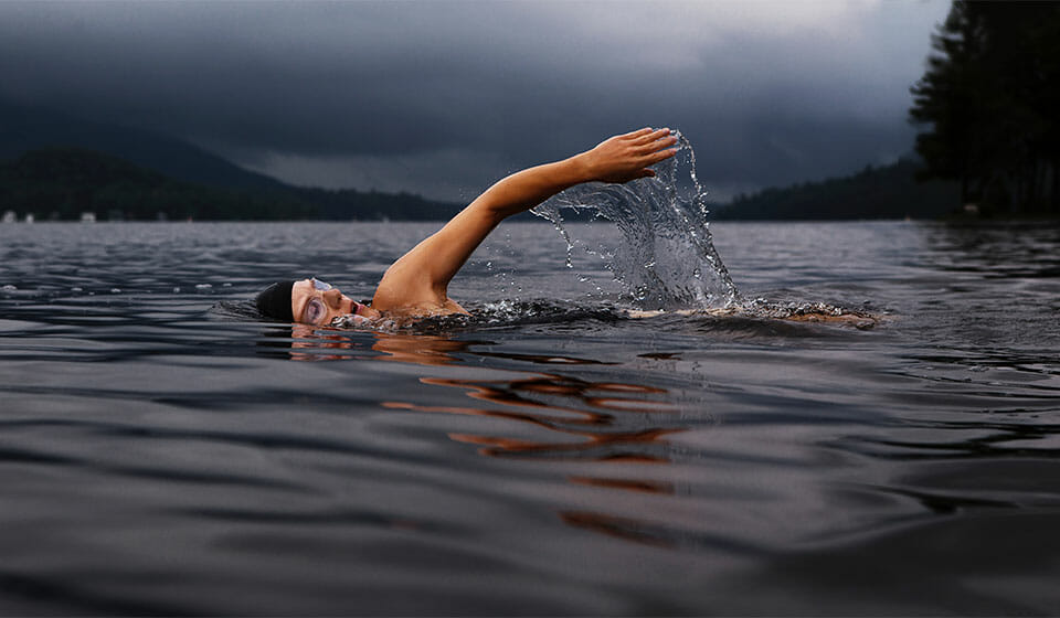 A woman swimming in a lake