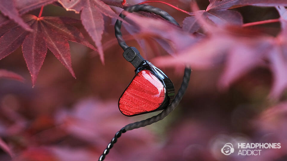 TRUTHEAR x Crinacle Zero Red earbud on a branch