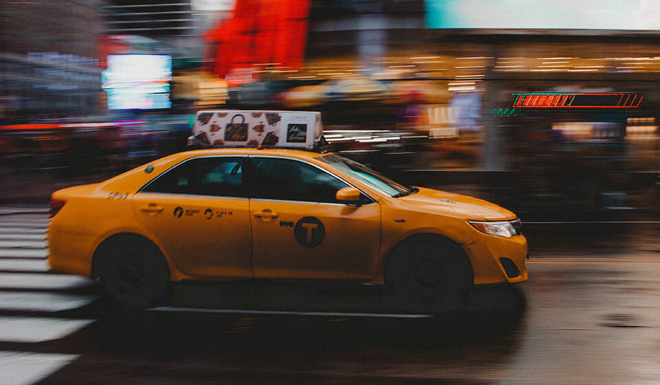 Taxi driving in the street.