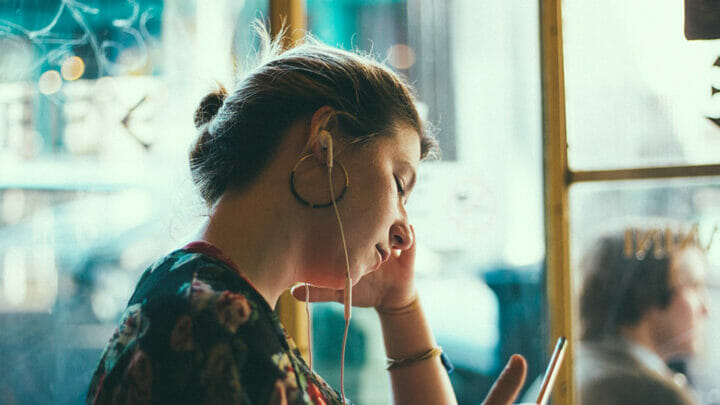 Woman with earbuds