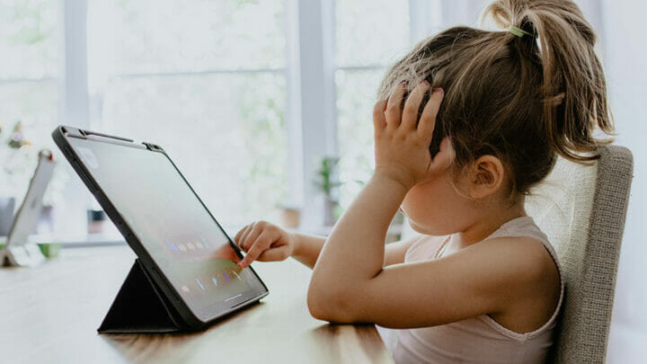 Kid in front of the screen