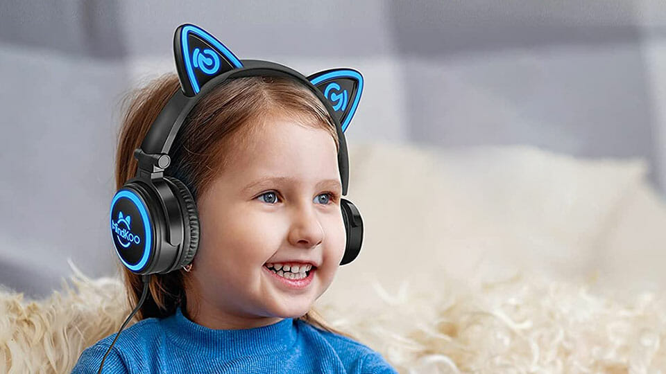 Kid wearing cat ear headphones